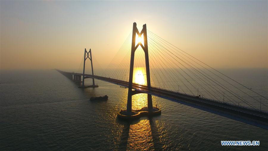 Xinhua Headlines: World's longest cross-sea bridge opens, integrating China's Greater Bay Area