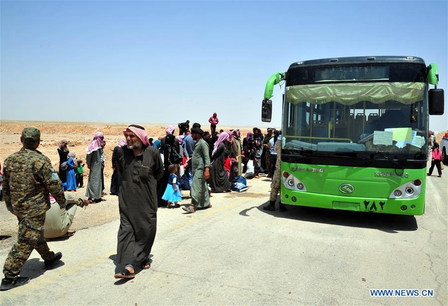 SYRIA-HOMS-REFUGEES-RETURN