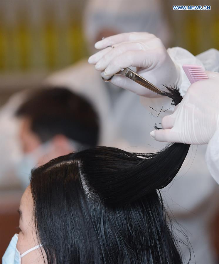 CHINA-HUBEI-WUHAN-LONGTAITOU DAY-MEDICAL STAFF-HAIRCUT (CN)